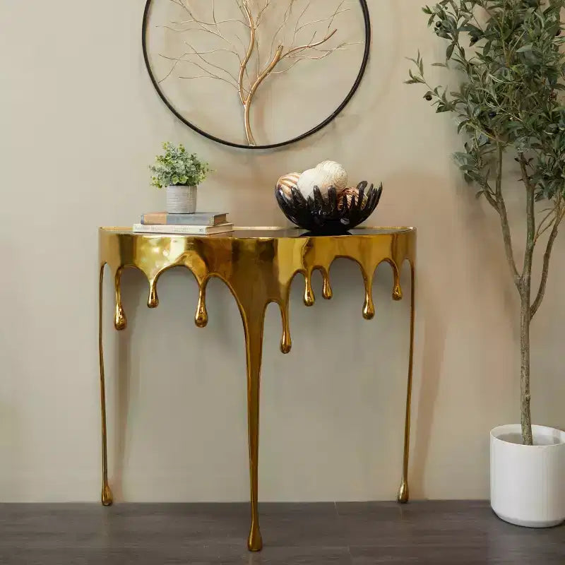 Olivia & May Aluminum Drip Console Table with Melting Designed Legs and Shaded Glass Top