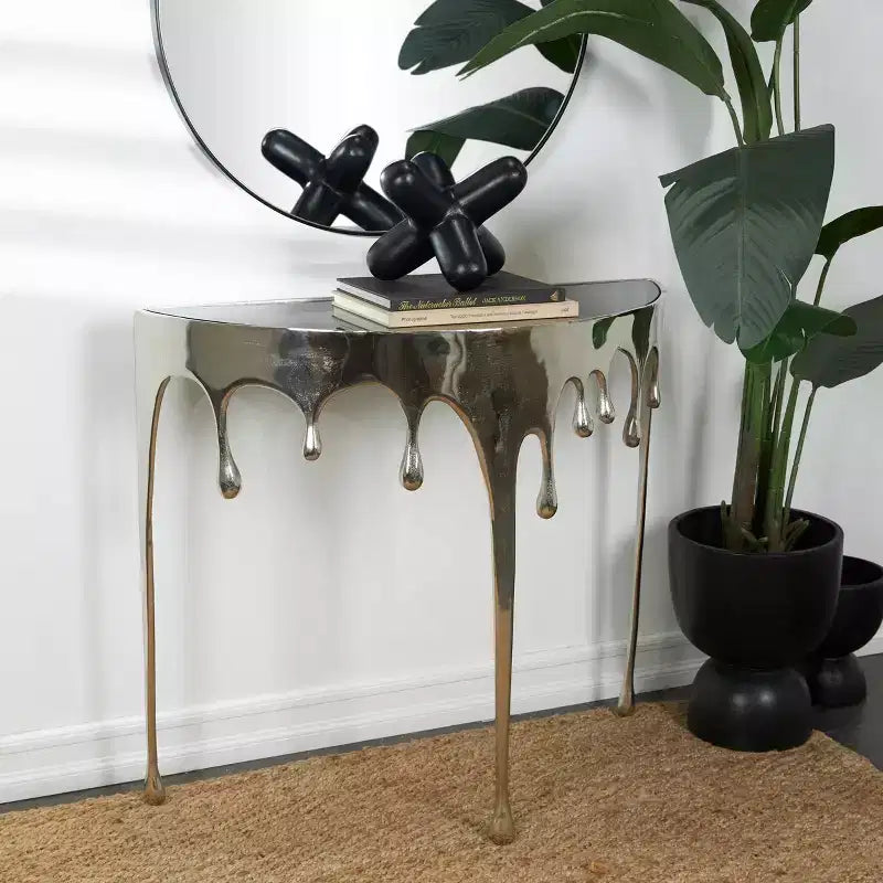 Olivia & May Aluminum Drip Console Table with Melting Designed Legs and Shaded Glass Top