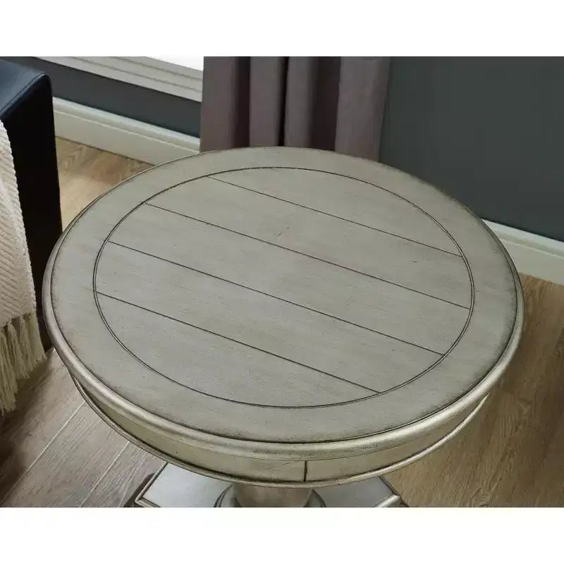 Round wooden pedestal side table, champagne